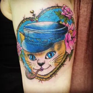 Tattoo von Tschiggy mit einer Katze im Bubblegum-Art-Stil