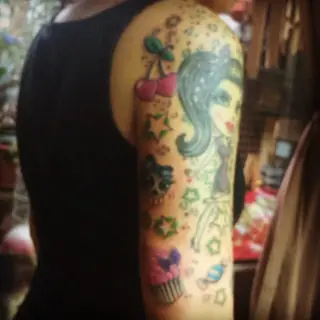 Tattoo von Tschiggy mit einer Katze im Bubblegum-Art-Stil