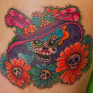 Tattoo von Tschiggy mit La Catrina und einem mexikanischen Zuckerschädel im Bubblegum-Art-Stil