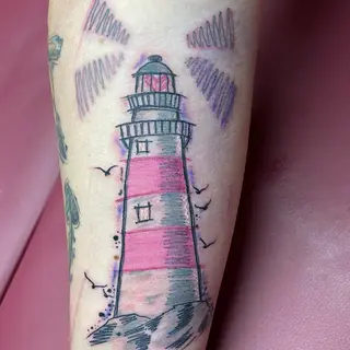 Tattoo von Tschiggy mit einem Leuchtturm im Bubblegum-Art-Stil