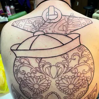 Tattoo-Entwurf von Tschiggy mit einem mexikanischen Zuckerschädel im Bubblegum-Art-Stil